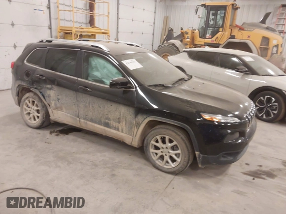 2015 Jeep Cherokee Latitude with VIN 1C4PJLCS8FW689849, listed as a IAAI auction lot 42144161 with 138,740 mi miles and . Bid and sale history available at carsss.com. Image 1.