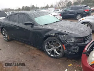 2015 Dodge Charger SXT z VIN 2C3CDXHG3FH754224, wystawiony jako IAAI lot #41527488 z przebiegiem 162 116 mil mil oraz . Historia ofert i sprzedaży dostępna na DreamBid. Obrazek 1.