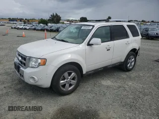 2010 Ford Escape Limited with VIN 1FMCU0E74AKC89196, listed as a Copart auction lot 50990585 with 144,830 mi miles and Salvage title. Bid and sale history available at DreamBid. Image 1.
