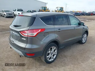 2013 Ford Escape SEL with VIN 1FMCU0HX0DUD71088, listed as a IAAI auction lot 41880044 with 155,439 mi miles. Bid and sale history available at carsss.com. Image 4.