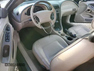 2004 Ford Mustang Deluxe with VIN 1FAFP44414F125267, listed as a Copart auction lot 74595714 with 0 mi miles and Salvage Title. Bid and sale history available at carsss.com. Image 8.