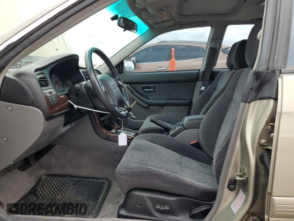 2000 Subaru Legacy with VIN 4S3BE6451Y7207874, listed as a Copart auction lot 59583325 with 57,861 mi miles and Salvage title. Bid and sale history available at DreamBid. Image 7.