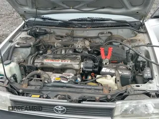 1991 Toyota Corolla z VIN 2T1AE94A6MC082910, wystawiony jako IAAI lot #43028426 z przebiegiem 105 269 mil mil oraz . Historia ofert i sprzedaży dostępna na DreamBid. Obrazek 12.
