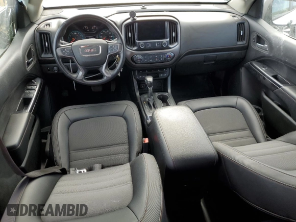 2022 GMC Canyon 4WD AT4 z VIN 1GTG6FEN0N1164841, wystawiony jako Copart lot #54440155 z przebiegiem 31 658 mil mil oraz Szkoda całkowita • Salvage title. Historia ofert i sprzedaży dostępna na DreamBid. Obrazek 8.