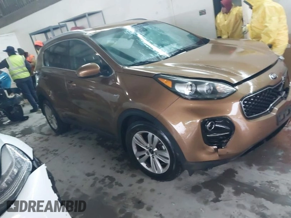 2018 Kia Sportage LX with VIN KNDPMCACXJ7446520, listed as a IAAI auction lot 41568985 with 79,601 mi miles and . Bid and sale history available at DreamBid. Image 1.