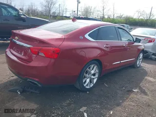 2014 Chevrolet Impala LTZ with VIN 2G1155S3XE9100493, listed as a IAAI auction lot 41944053 with 86,411 mi miles. Bid and sale history available at carsss.com. Image 4.