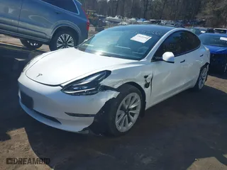 2022 Tesla Model 3 Long Range with VIN 5YJ3E1EB3NF186074, listed as a IAAI auction lot 41652266 with 90,933 mi miles. Bid and sale history available at carsss.com. Image 18.