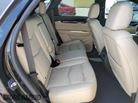2017 Cadillac XT5 FWD with VIN 1GYKNARS2HZ131243, listed as a Copart auction lot 54189395 with 134,324 mi miles and Salvage Title. Bid and sale history available at DreamBid. Image 11.