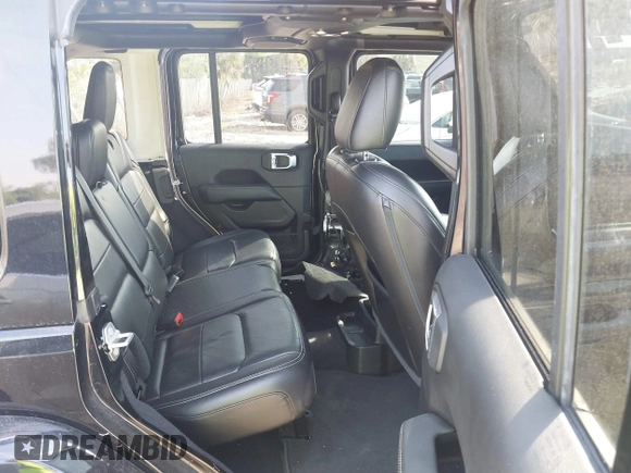 2021 Jeep Wrangler Unlimited Sahara with VIN 1C4HJXEG3MW536507, listed as a IAAI auction lot 41601893 with 51,214 mi miles and . Bid and sale history available at DreamBid. Image 8.