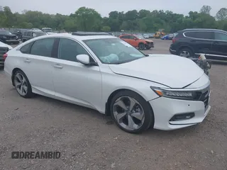 2018 Honda Accord Touring z VIN 1HGCV1F96JA010037, wystawiony jako IAAI lot #42234333 z przebiegiem 26 470 mil mil oraz . Historia ofert i sprzedaży dostępna na DreamBid. Obrazek 1.