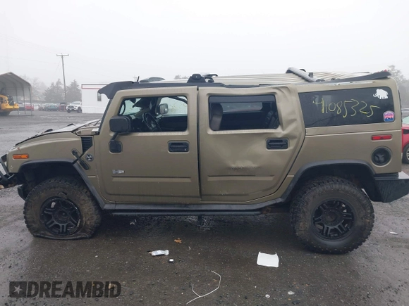 2005 Hummer H2 SUV with VIN 5GRGN23U35H130615, listed as a IAAI auction lot 41085325 with 138,393 mi miles. Bid and sale history available at carsss.com. Image 14.