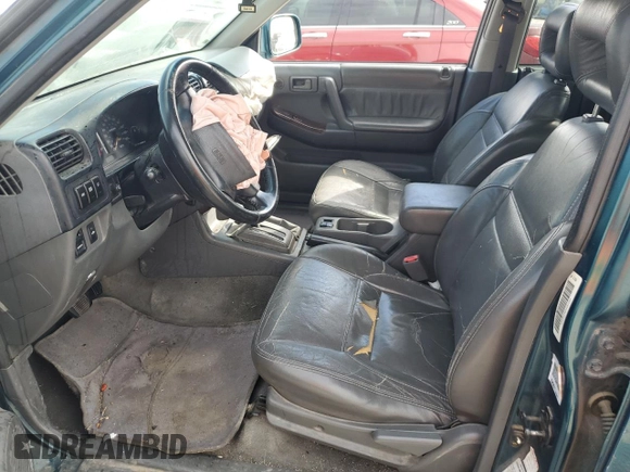 1998 Isuzu Rodeo S with VIN 4S2CM58W8W4368553, listed as a Copart auction lot 71313904 with 183,059 mi miles and Salvage title. Bid and sale history available at DreamBid. Image 7.