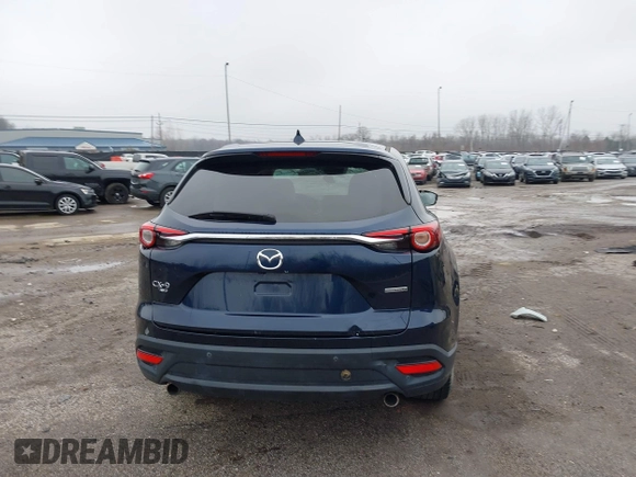 2021 Mazda CX-9 Touring z VIN JM3TCBCY4M0520362, wystawiony jako IAAI lot #41193396 z przebiegiem 17 323 mil mil oraz . Historia ofert i sprzedaży dostępna na DreamBid. Obrazek 16.