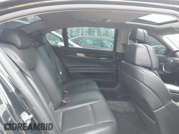 2011 BMW 7 Series 750Li xDrive with VIN WBAKC8C52BC431668, listed as a IAAI auction lot 41623575 with 117,306 mi miles. Bid and sale history available at carsss.com. Image 8.