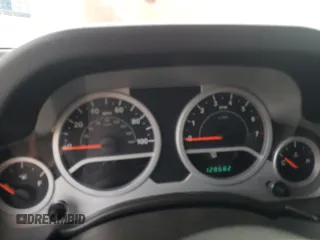 2007 Jeep Wrangler Sahara с VIN 1J4FA54137L205242, выставлен на аукционе Copart как лот 65080025 с пробегом 128 682 миль миль и Списание • Salvage title. История ставок и продаж доступна на DreamBid. Изображение 9.