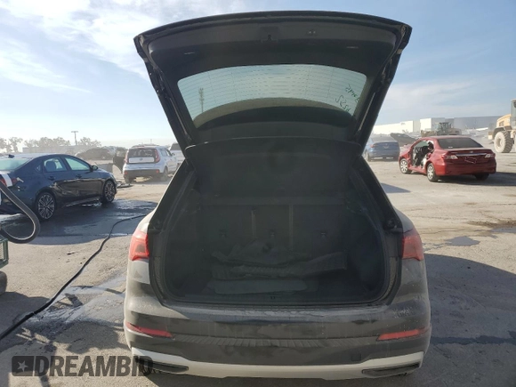 2022 Audi Q3 Premium with VIN WA1AUCF32N1001495, listed as a Copart auction lot 83381104 with 24,682 mi miles and Salvage Title. Bid and sale history available at carsss.com. Image 6.