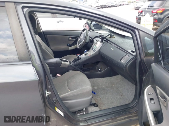 2012 Toyota Prius One z VIN JTDKN3DU0C1592300, wystawiony jako IAAI lot #42225324 z przebiegiem 171 746 mil mil oraz . Historia ofert i sprzedaży dostępna na DreamBid. Obrazek 5.