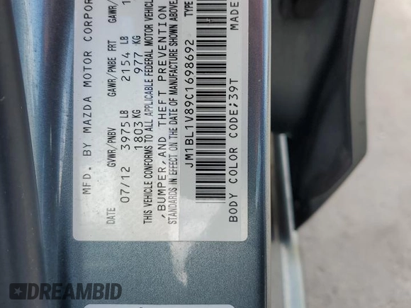 2012 Mazda 3 i Touring with VIN JM1BL1V89C1698692, listed as a Copart auction lot 61723555 with 112,065 mi miles and Clean title. Bid and sale history available at DreamBid. Image 12.
