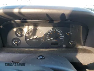 1999 Jeep Grand Cherokee Laredo z VIN 1J4GW58N1XC737706, wystawiony jako Copart lot #83107914 z przebiegiem Nie podano mil oraz Szkoda całkowita • Salvage title. Historia ofert i sprzedaży dostępna na DreamBid. Obrazek 9.