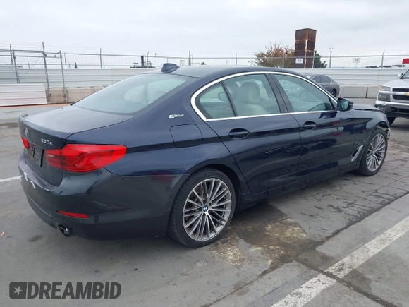 2019 BMW 5 Series 530e with VIN WBAJA9C56KB388241, listed as a IAAI auction lot 42181217 with 69,805 mi miles and . Bid and sale history available at carsss.com. Image 4.