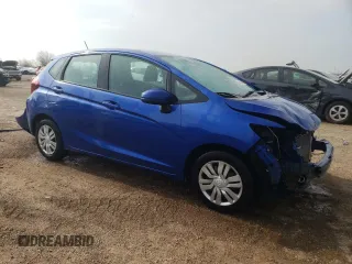 2015 Honda Fit LX с VIN 3HGGK5H57FM725785, выставлен на аукционе Copart как лот 54344325 с пробегом 76 849 миль миль и Списание • Salvage title. История ставок и продаж доступна на DreamBid. Изображение 4.