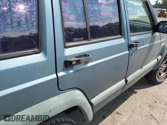 1997 Jeep Cherokee Sport with VIN 1J4FJ68S4VL607745, listed as a Copart auction lot 67521394 with 143,814 mi miles and Clean Title. Bid and sale history available at carsss.com. Image 11.
