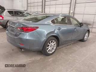 2015 Mazda 6 i Sport with VIN JM1GJ1U65F1170793, listed as a IAAI auction lot 41266146 with 125,701 mi miles and . Bid and sale history available at carsss.com. Image 4.