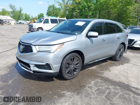 2018 Acura MDX Technology with VIN 5J8YD4H57JL003610, listed as a IAAI auction lot 42127585 with 82,633 mi miles and . Bid and sale history available at DreamBid. Image 17.