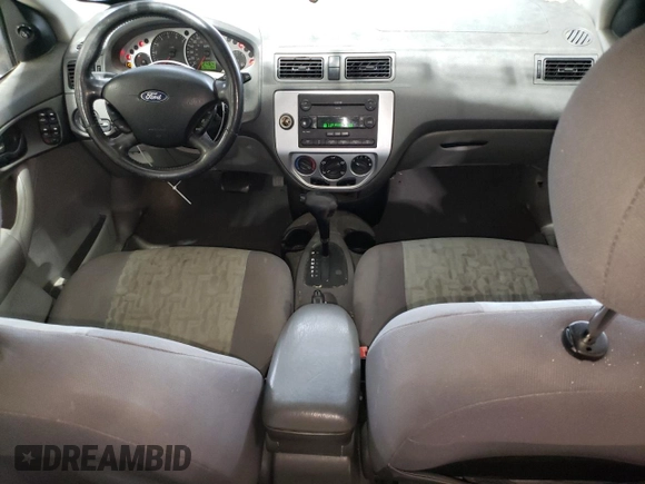2005 Ford Focus SE with VIN 1FAHP36N65W187161, listed as a Copart auction lot 52024045 with 261,194 mi miles and Salvage Title. Bid and sale history available at carsss.com. Image 8.