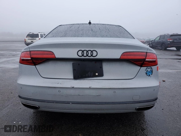 2016 Audi A8 3.0T z VIN WAU34AFD5GN014679, wystawiony jako Copart lot #86691744 z przebiegiem 119 422 mil mil oraz Szkoda całkowita • Salvage title. Historia ofert i sprzedaży dostępna na DreamBid. Obrazek 6.