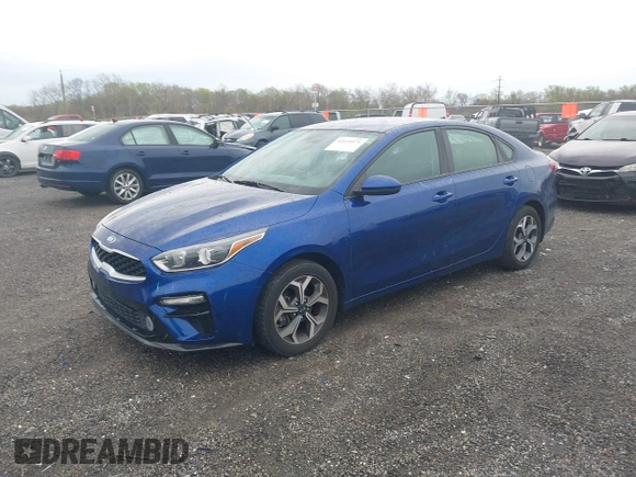 2019 Kia Forte LXS z VIN 3KPF24AD6KE041448, wystawiony jako IAAI lot #42035571 z przebiegiem 128 536 mil mil oraz . Historia ofert i sprzedaży dostępna na DreamBid. Obrazek 2.