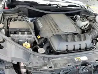 2019 Jeep Grand Cherokee Overland z VIN 1C4RJFCTXKC788137, wystawiony jako Copart lot #70804105 z przebiegiem 105 822 mil mil oraz Szkoda całkowita • Salvage title. Historia ofert i sprzedaży dostępna na DreamBid. Obrazek 13.