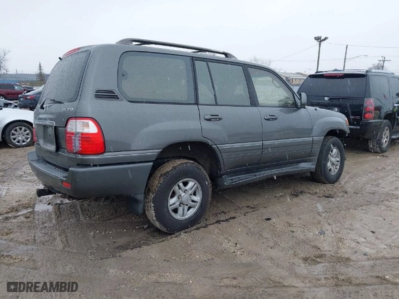 2000 Lexus LX 470 with VIN JT6HT00W8Y0092556, listed as a IAAI auction lot 41727615 with NaN miles. Bid and sale history available at carsss.com. Image 4.