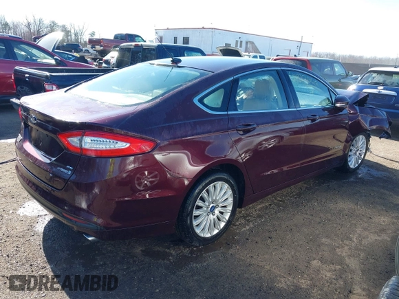 2013 Ford Fusion SE Hybrid with VIN 3FA6P0LU8DR206943, listed as a IAAI auction lot 41822643 with 141,484 mi miles. Bid and sale history available at carsss.com. Image 4.