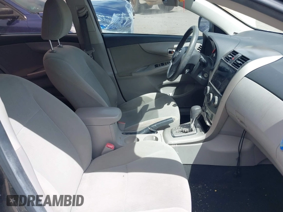 2011 Toyota Corolla L with VIN 2T1BU4EEXBC559590, listed as a IAAI auction lot 42101256 with 163,307 mi miles and . Bid and sale history available at DreamBid. Image 5.