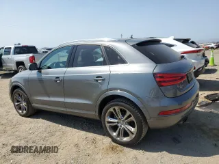 2015 Audi Q3 Prestige with VIN WA1GFCFS8FR009731, listed as a Copart auction lot 59897225 with 84,138 mi miles and Salvage title. Bid and sale history available at DreamBid. Image 2.