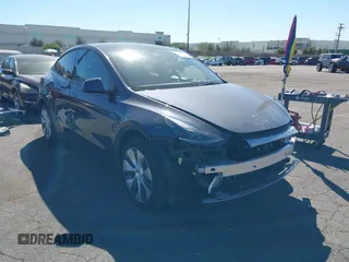 2023 Tesla Model Y Long Range with VIN 7SAYGAEE8PF976969, listed as a IAAI auction lot 41877784 with 25,896 mi miles. Bid and sale history available at carsss.com. Image 14.