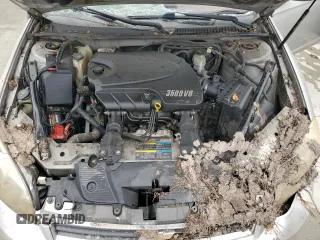 2006 Chevrolet Monte Carlo LS z VIN 2G1WJ15KX69247931, wystawiony jako Copart lot #57317285 z przebiegiem 165 525 mil mil oraz Nie do naprawy. Historia ofert i sprzedaży dostępna na DreamBid. Obrazek 11.