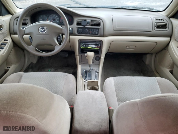 2001 Mazda 626 LX with VIN 1YVGF22C215245817, listed as a Copart auction lot 80491144 with 147,603 mi miles and Salvage Title. Bid and sale history available at carsss.com. Image 8.