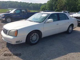 2004 Cadillac DeVille DHS z VIN 1G6KE57Y24U260694, wystawiony jako IAAI lot #42235533 z przebiegiem 156 689 mil mil oraz . Historia ofert i sprzedaży dostępna na DreamBid. Obrazek 2.
