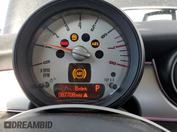 2012 MINI Hardtop with VIN WMWSU3C54CT255997, listed as a Copart auction lot 49162435 with 87,708 mi miles and Salvage Title. Bid and sale history available at DreamBid. Image 9.