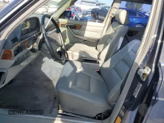 1990 Mercedes-Benz 560 with VIN WDBCA39EXLA503543, listed as a Copart auction lot 65978444 with 195,635 mi miles and Clean Title. Bid and sale history available at DreamBid. Image 7.