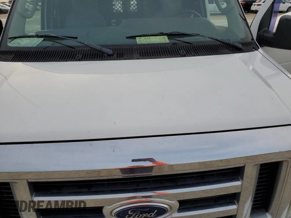 2009 Ford Econoline Cargo Commercial with VIN 1FTNE14W69DA79580, listed as a Copart auction lot 77773694 with Not Provided miles and Salvage Title. Bid and sale history available at DreamBid. Image 11.