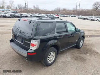 2009 Mercury Mariner Hybrid with VIN 4M2CU29359KJ09642, listed as a IAAI auction lot 41734762 with 233,989 mi miles. Bid and sale history available at carsss.com. Image 17.