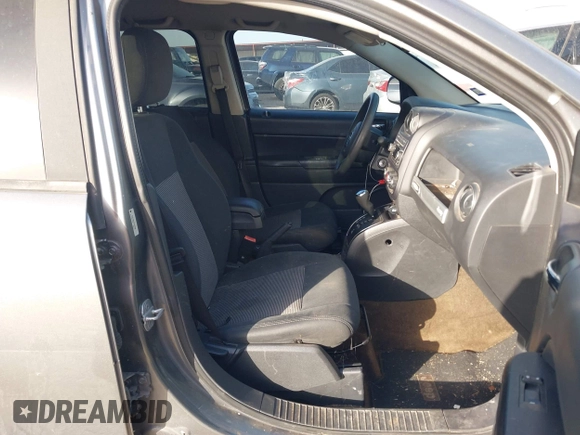 2014 Jeep Compass Sport with VIN 1C4NJCBA6ED620698, listed as a IAAI auction lot 41852056 with 193,085 mi miles and . Bid and sale history available at DreamBid. Image 5.