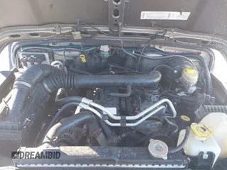 2004 Jeep Wrangler Sahara with VIN 1J4FA59S94P731123, listed as a IAAI auction lot 41288284 with 138,515 mi miles and . Bid and sale history available at DreamBid. Image 10.