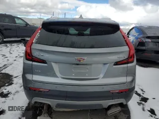 2023 Cadillac XT4 AWD Premium Luxury with VIN 1GYFZDR45PF200550, listed as a Copart auction lot 49917505 with 13,651 mi miles and Non repairable. Bid and sale history available at DreamBid. Image 6.