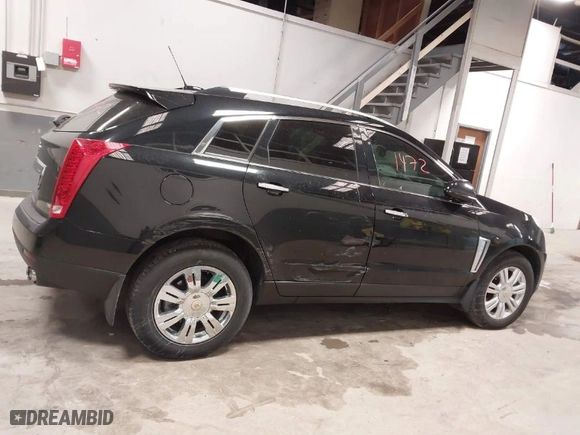 2015 Cadillac SRX Luxury Collection with VIN 3GYFNEE38FS628508, listed as a IAAI auction lot 41411472 with 120,123 mi miles. Bid and sale history available at carsss.com. Image 13.