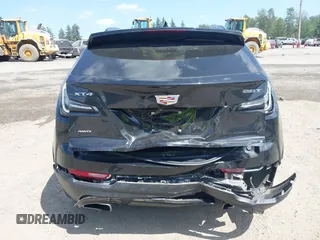 2019 Cadillac XT4 AWD Sport z VIN 1GYFZFR48KF119062, wystawiony jako IAAI lot #42449132 z przebiegiem 89 676 mil mil oraz . Historia ofert i sprzedaży dostępna na DreamBid. Obrazek 16.