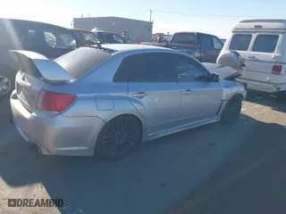 2014 Subaru Impreza Sedan WRX WRX STI Limited with VIN JF1GV8J61EL012932, listed as a IAAI auction lot 40822250 with 65,464 mi miles. Bid and sale history available at carsss.com. Image 4.